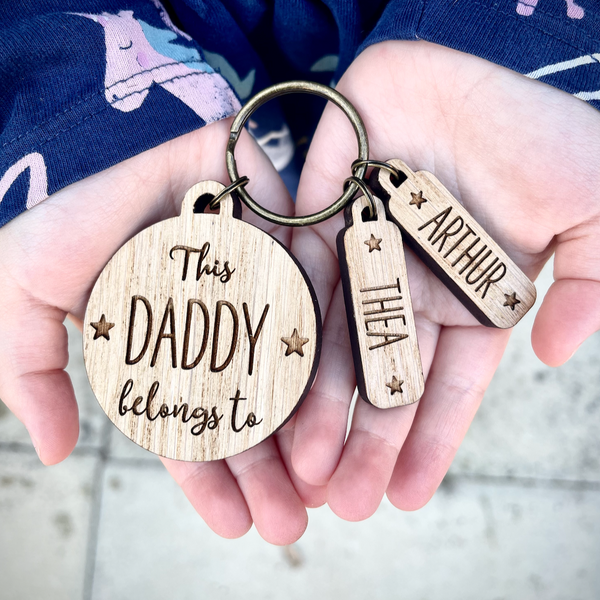 This Mummy Daddy belongs to. Personalised Wooden Keyring Bear and Rose