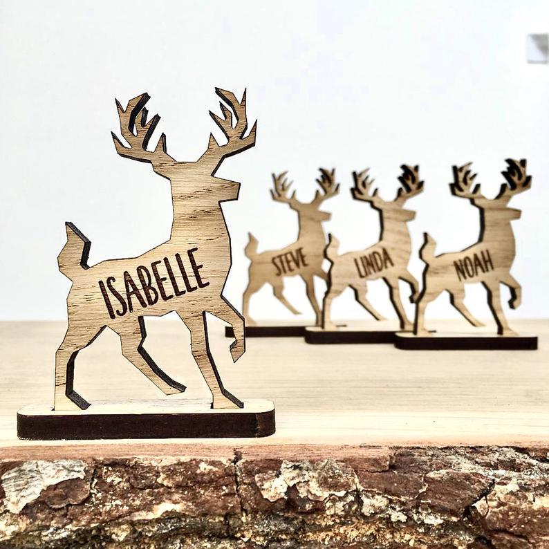 Standing stag or reindeer with engraved name for use on a table as a place name